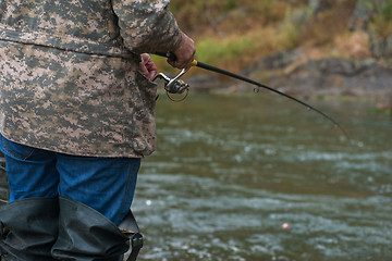 Image showing Fisherman at the Altai river