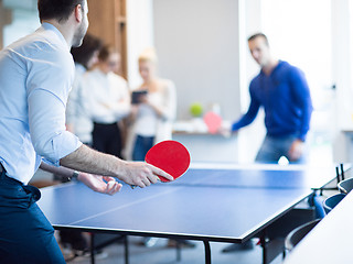 Image showing startup business team playing ping pong tennis