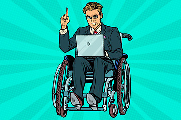 Image showing businessman in wheelchair with laptop