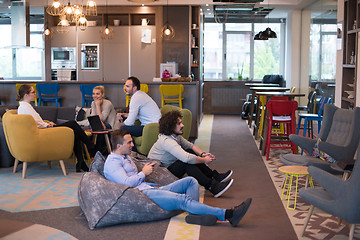 Image showing startup Office Workers Playing computer games