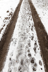 Image showing traces of the car on snow