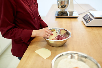 Image showing chef making macaron batter at kitchen