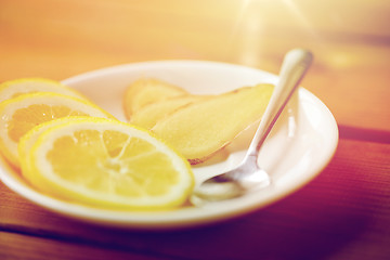 Image showing lemon and ginger on plate with spoon