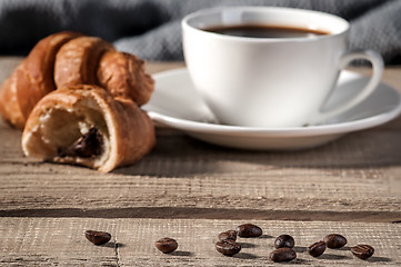 Image showing Coffee beans on the wooden table