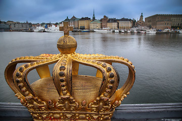 Image showing Skeppsholmsbron (Skeppsholm Bridge) with Golden Crown on a bridg