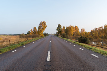 Image showing Straight road into a colorful landscape