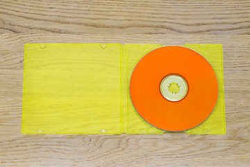 Image showing Listen to the music, orange cd and yellow plastic case