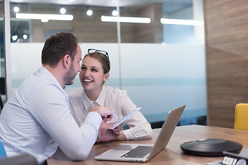 Image showing Business People Working With Tablet in startup office