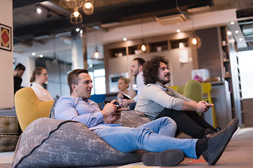 Image showing startup Office Workers Playing computer games