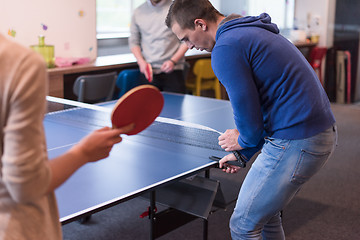 Image showing startup business team playing ping pong tennis