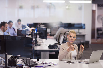 Image showing businesswoman using a laptop in startup office