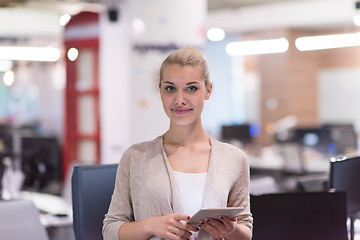 Image showing Business Woman Using Digital Tablet in front of startup Office