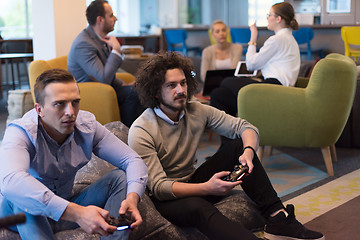 Image showing startup Office Workers Playing computer games