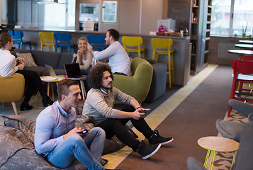 Image showing startup Office Workers Playing computer games