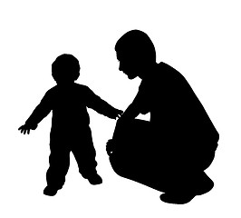Image showing Affectionate father looking at his baby walking