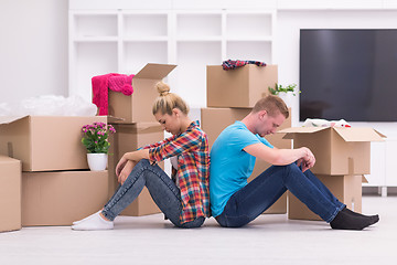 Image showing young couple moving  in new house