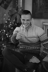 Image showing Happy young man with a glass of champagne