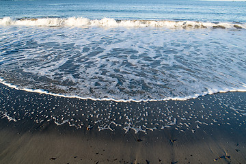 Image showing Wave on sand