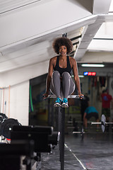 Image showing black woman doing parallel bars Exercise