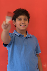 Image showing Portrait of a happy young boy painter