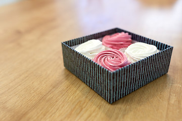 Image showing zephyr or marshmallow dessert in gift box