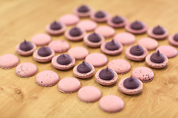 Image showing macarons on table at confectionery or bakery