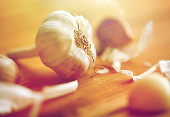 Image showing close up of garlic on wooden table