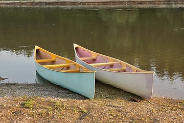 Image showing Canoes on the Riverside