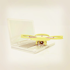 Image showing Drone and laptop. 3D render. Vintage style.