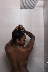 Image showing African American woman in the shower