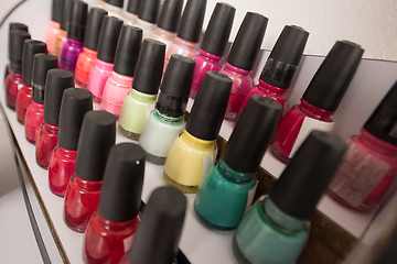 Image showing Set of different bottles of nail polish