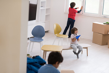 Image showing boys in a new modern home