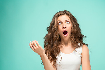 Image showing Portrait of young woman with shocked facial expression