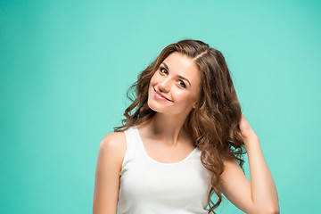 Image showing The young woman\'s portrait with happy emotions