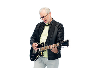 Image showing happy senior man playing electric guitar