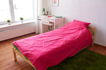 Image showing kids room interior with bed, table and accessories