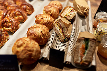 Image showing bread and sandwiches with price at grocery store