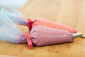 Image showing confectionery bags with macaron batter or cream