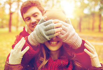 Image showing happy young couple having fun in autumn park