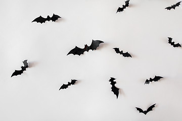 Image showing black paper bats over white background