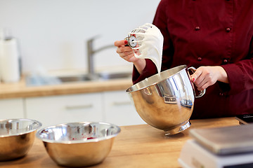 Image showing chef with whisk and whipped egg whites at kitchen