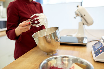 Image showing chef with whisk and whipped egg whites at kitchen