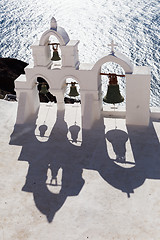 Image showing Traditional bell tower in Oia village of Cyclades Island, Santorini, Greece.