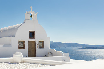 Image showing Traditional white orthodox church in Oia, Santorini, Greece.