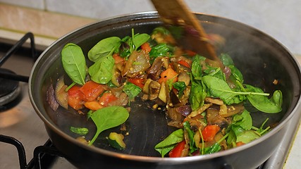 Image showing Preparing hot breakfast