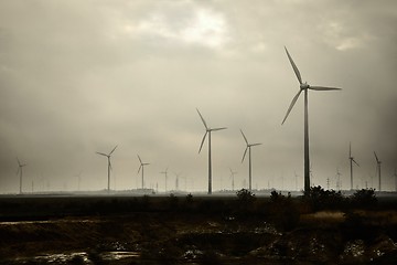 Image showing Wind tubines in rain