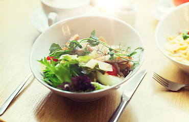 Image showing close up of caesar salad on plate at restaurant