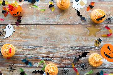 Image showing halloween party paper decorations and treats