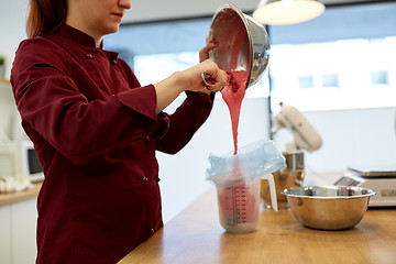 Image showing chef making macaron batter at kitchen