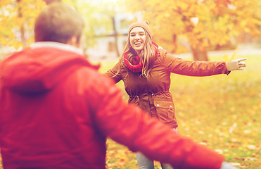 Image showing happy young couple meeting in autumn park